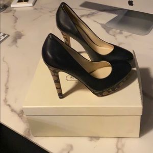 Black Coach pumps with logo